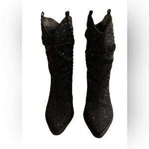 Jessica Simpson 
Cowboy boots